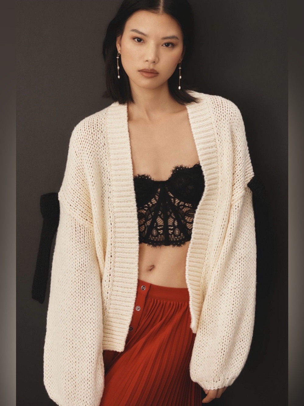 Anthropologie Maeve Chunky Bow Cardigan Sweater in cream and black. One size.